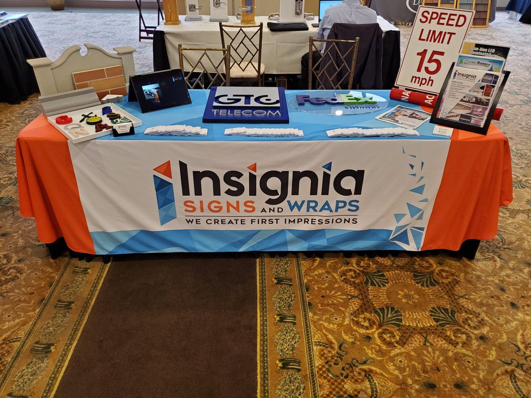 Insignia Signs & Wraps trade show table throw